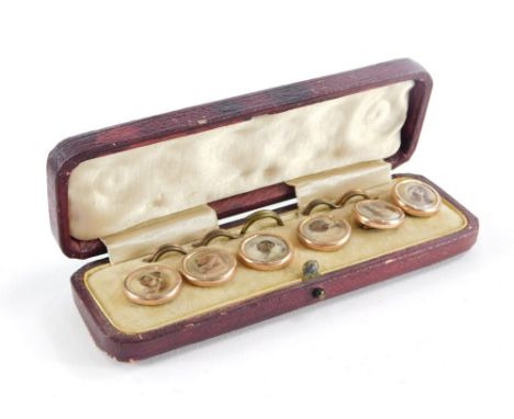 A set of gilt metal dog lithograph cufflinks, cased.