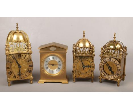 Three brass cased lantern clocks and another solid brass cased mantel clock with silvered chapter ring and platform escapemen