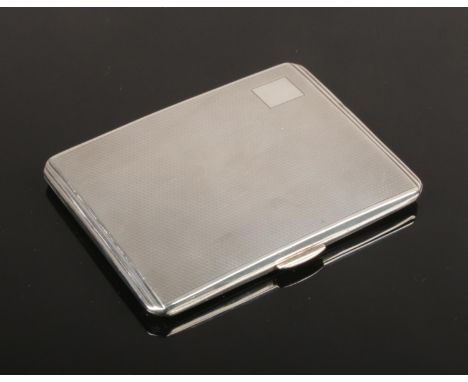 An Art Deco silver cigarette case with engine turned engraving by Smith &amp; Bartlam. Assayed Birmingham 1943, 159 grams, 11