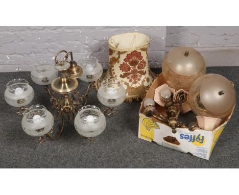 A six branch hanging light and a box of lighting parts and shades etc.  