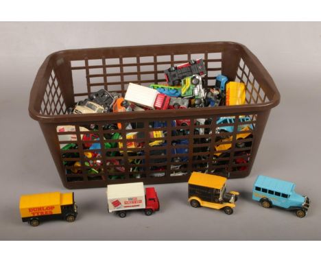 A collection of Die cast vehicles, Matchbox, Corgi examples, Dunlop Tyres, Smiths crisps etc  