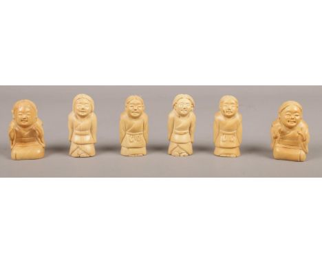 A collection of carved boxwood Netsuke.  