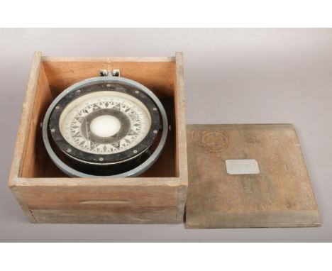 A ships gimbal compass in case. Label to the outer case indistinct. (Total width 24cm).  Glass good.