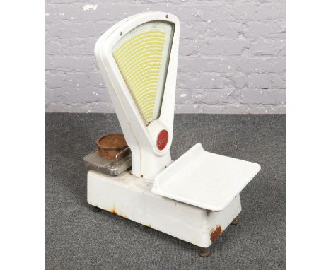 A set of vintage enamel Berkel shop counter scales.  