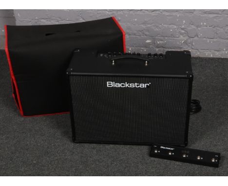 A Blackstar 100 Watt Stereo Guitar Amplifier Model ID Core 100 with FS 12 foot controller and cover  