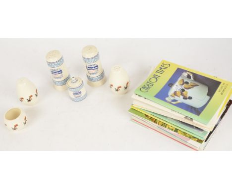 A small group of Guinness and Heineken cruet pots,  three with the Guinness toucan and three with banded blue design, all by 