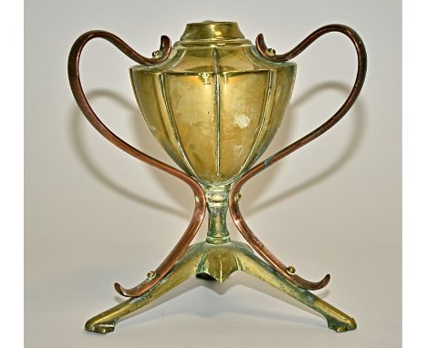 Manner of W A S Benson, a copper and brass oil lamp base,  supported on a tri-form base, height 17cm 