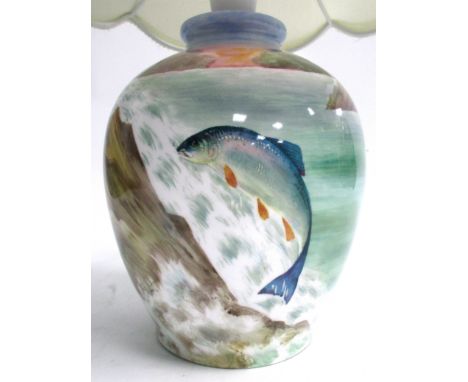 A Minton china table lamp with hand painted study of a salmon leaping up rocks,  signed B.Cheadle, approximate height of base