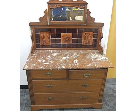 An Edwardian walnut tiled backed wash stand,  two short over two long drawers to base, panelled sides, raised on a bracket pl