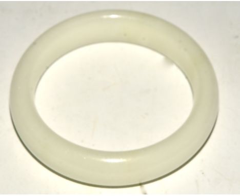 A white jade bangle,  with highly polished surface, diameter 7.5cm 