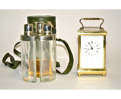 A three sectioned hip flask holder,  the three inner bottles fitting together to a cylindrical shape, height 19cm, together w