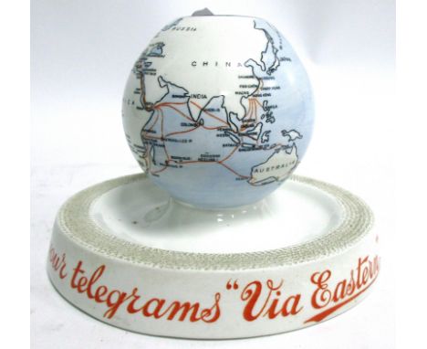 An early 20th Century Minton ash tray match holder and striker retailed by A W Savill &amp; Co,  of globe form with the capti