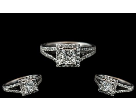 Platinum - Superb Split-Set Diamond Set Dress Ring. The Central Princes Cut Diamond Surrounded by White Diamonds Which Extend