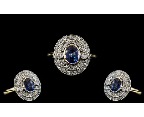 18ct Gold - Attractive and Good Quality Diamond and Sapphire Set Dress Ring of Pleasing Design. The Central Cornflower Blue S