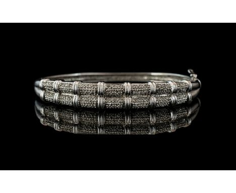 9ct White Gold Diamond Hinged Bangle - The Front Set with Round Pave Cut Diamonds, Fully Hallmarked, Diamond Weight 0.50 cts.