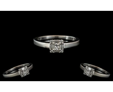 Platinum Set - Attractive Diamond Set Dress Ring. Marked PT 950. The Princes Cut and Emerald Cut Diamonds of Good Colour / Cl