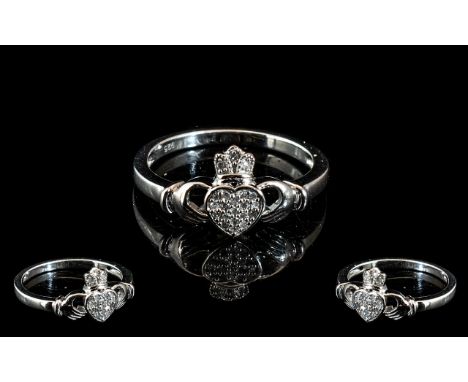 Diamond Set Claddagh Ring, the two clasping hands, representing friendship, here holding a crowned heart, pave set with diamo