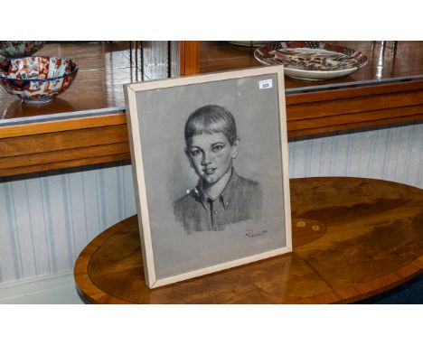 Sketch of a Young Boy, signed and dated, framed and glazed, overall size measures 21" x 17".