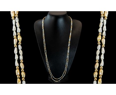Ladies - Attractive and Excellent Quality Freshwater Pearl Necklace of Extra Long Length. Set with 18ct Gold Spacers, As New 