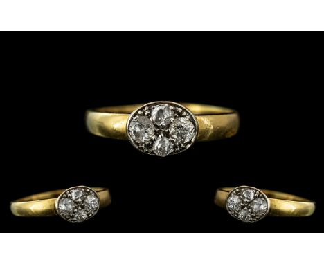 An 18ct Gold Diamond Ring set with 4 old cut diamonds ring size N