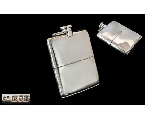 A Goldsmiths and Silversmiths Silver Hip Flask fully hallmarked for London 1914. Approximately 5 x 3 3/4 inches. Gross weight