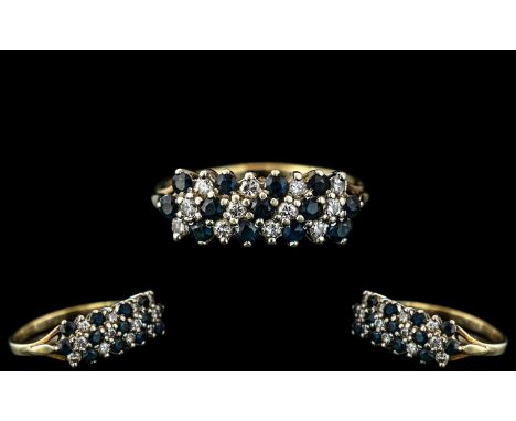 Ladies Attractive 9ct Gold Diamond and Sapphire Set Ring, fully hallmarked to interior of shank; set with twelve diamonds and