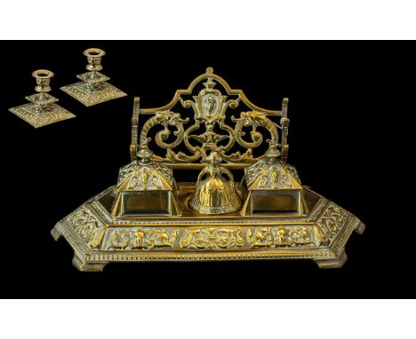 Vintage Brass Desktop Inkwell with two wells and a bell, together with a pair of brass candlesticks.