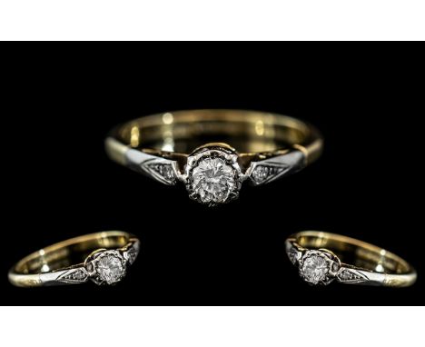 An 18ct Gold Diamond Ring, illusion set round cut diamond, between diamond set shoulders, fully hallmarked.  Ring size L.5, g