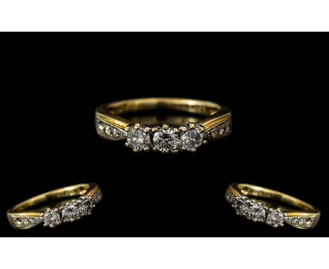 18ct Yellow Gold - Attractive 3 Stone Diamond Set Dress Ring. Marked 18ct to Interior of Shank. The Central 3 Brilliant Cut D