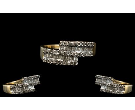 Ladies Nice Quality 9ct Gold - Diamond Set Designer Ring. The Baguette and Brilliant Cut Diamonds of Good Colour / Clarity. D