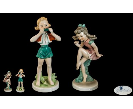 W. Goebel - Pair of Hand Painted Early Figures. Titled 1/  ' Nosha ' Girl Playing Harmonica, 7 Inches - 17.5 cms Tall. 2/ ' N