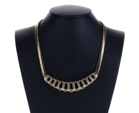 Christian Dior yellow metal collar with stone set feature. Measures approx. 40cm with 5cm extender. Signed on the reverse of 