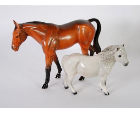 ROYAL DOULTON POTTERY MODEL OF A SHETLAND PONY, grey, 5 1/4" (13.3cm) high,  TOGETHER WITH A TAN COLOURED MODEL OF A RACEHORS