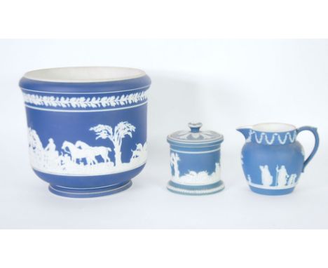 ADAMS DARK BLUE DIPPED JASPERWARE POTTERY JARDINIERE, typical form applied in white with a hunting scene beneath a leafy bord