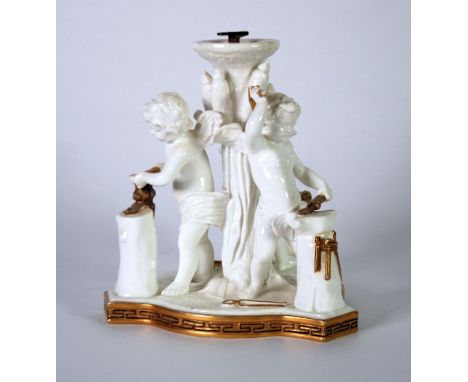 IMPRESSIVE MOORE (BROS.) WHITE CHINA PORCELAIN FIGURAL TABLE CENTRE BASE, the central rustic column enclosed by three cherubs