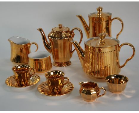 ROYAL WORCESTER PORCELAIN TEAPOT, COFFEE POT, CREAM JUG AND SUGAR BASIN, fluted and with all-over gilt decoration and a  WADE