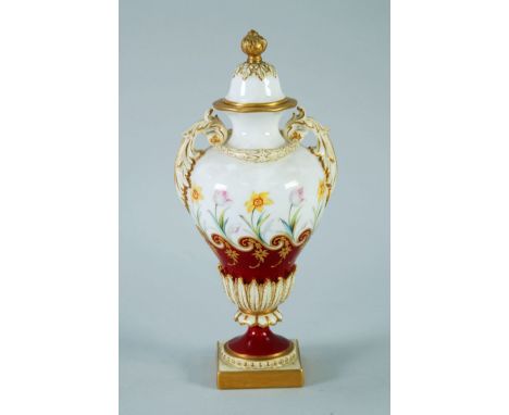 ROYAL WORCESTER PORCELAIN TWO HANDLE PEDESTAL VASE, and cover of inverted pyriform with scroll acanthus leaf handles, the bod