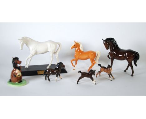 BESWICK WHITE GLAZED 'SPIRIT OF YOUTH' POTTERY MODEL OF A RACEHORSE, on ebonised wooden base, 8" (20.3cm) high overall, TOGET