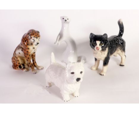 A BESWICK MODEL OF A TERRIER, a model of a black and white cat labelled 'Coopercraft', a 'Made in USSR' marked model of a win