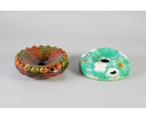 ART NOUVEAU POTTERY SPITTOON, with moulded water lily decoration, 8" (20.3cm) diameter (af) AND A GREEN BROWN GLAZED POTTERY 