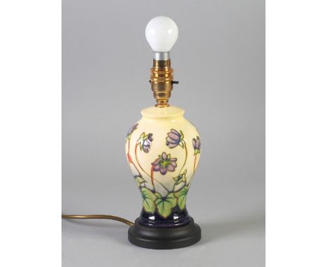 MODERN MOORCROFT HEPATICA PATTERN TUBE LINED POTTERY TABLE LAMP BASE, of  ovoid form, painted in colours on a cream/blue grou