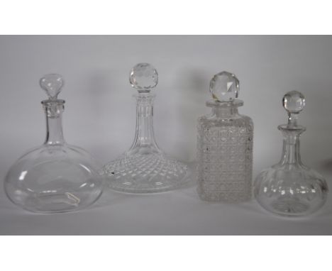 CUT GLASS SHIP'S DECANTER AND STOPPER, together with a square decanter and stopper and two others (4) 