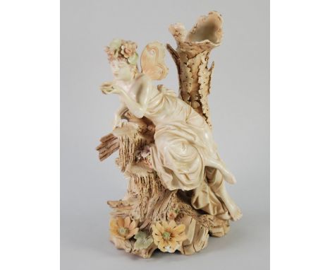 ROYAL DUX STYLE ART NOUVEAU PORCELAIN SPILL VASE GROUP, modelled as a wood nymph seated on a frozen waterfall and drinking fr