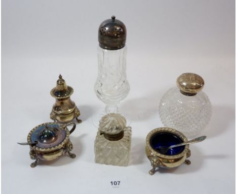 A Victorain cut glass scent bottle with silver lid embossed cherubs plus silver plated cruet set, inkwell etc. 