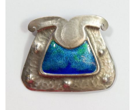 A Liberty Arts &amp; Crafts Archibold Knox pewter brooch with peacock blue enamel, 3.8 x 4.5cm