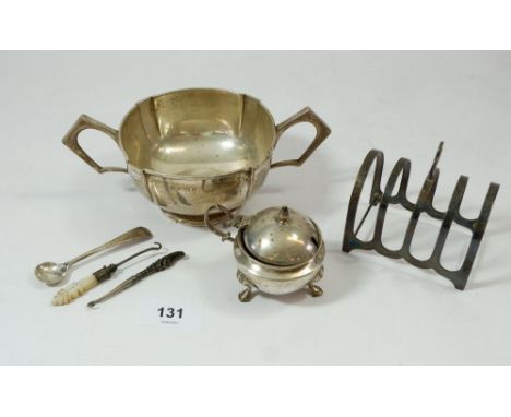 A silver sugar bowl, silver toast rack and a silver mustard pot plus two small button hooks, total weight 331g