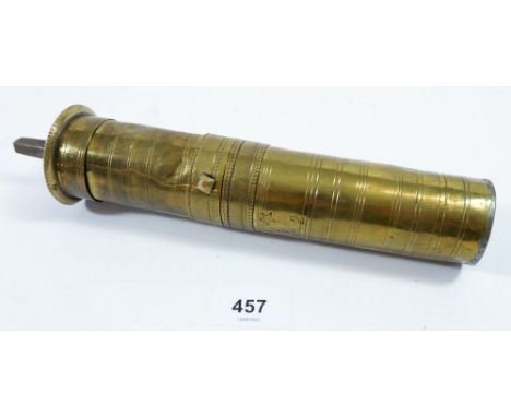 A brass Middle Eastern spice grinder 