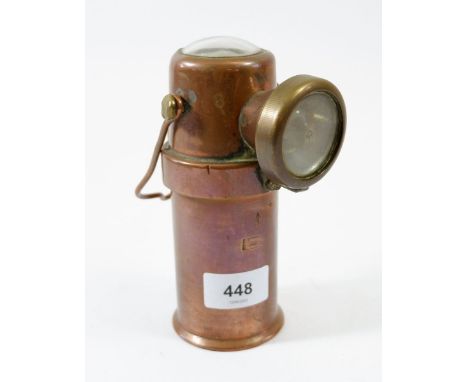 An antique copper foreman's mining lamp 