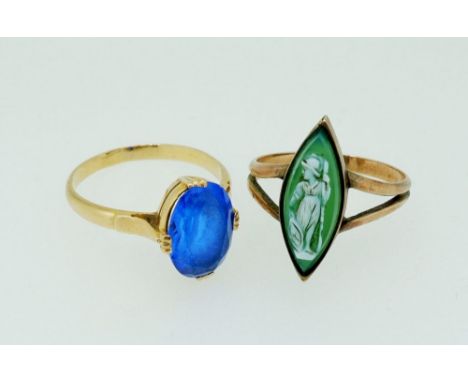 A yellow metal ring set blue stone, size O and a yellow metal marquise cameo ring, size N to O 