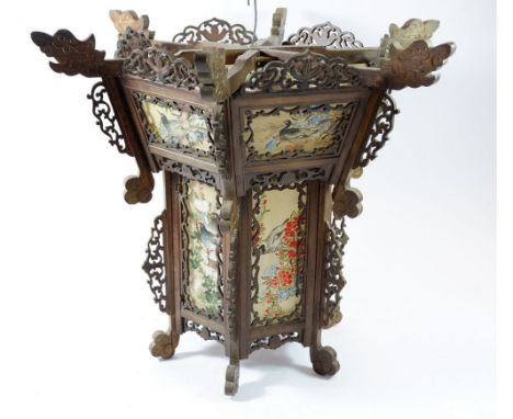 An Eastern octagonal wooden lantern with inset silk panels, a/f - 41cm tall